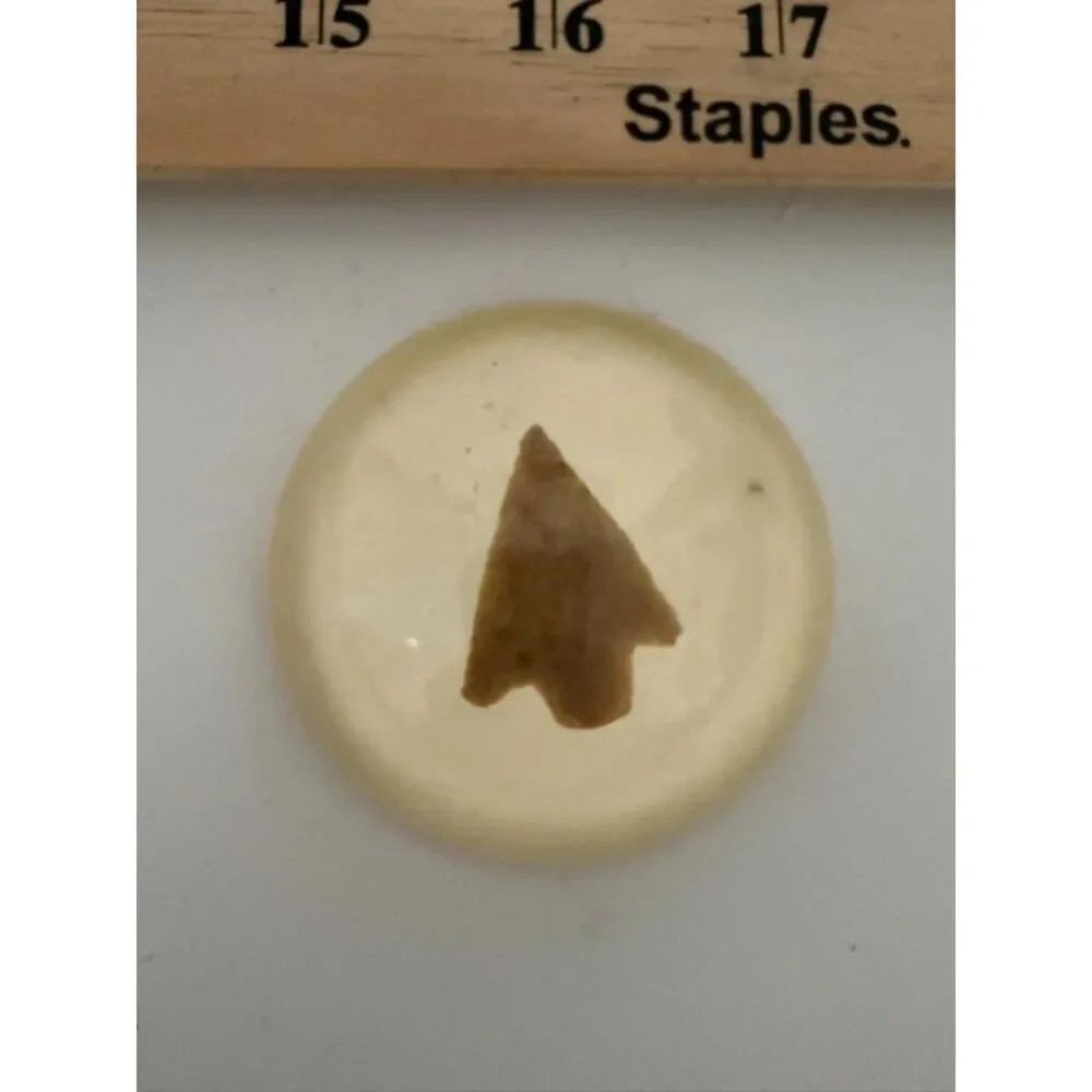 Bird Point Arrowhead paperweight (homemade) set in resin or plastic